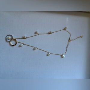 Elegant Gold and Pearl Necklace